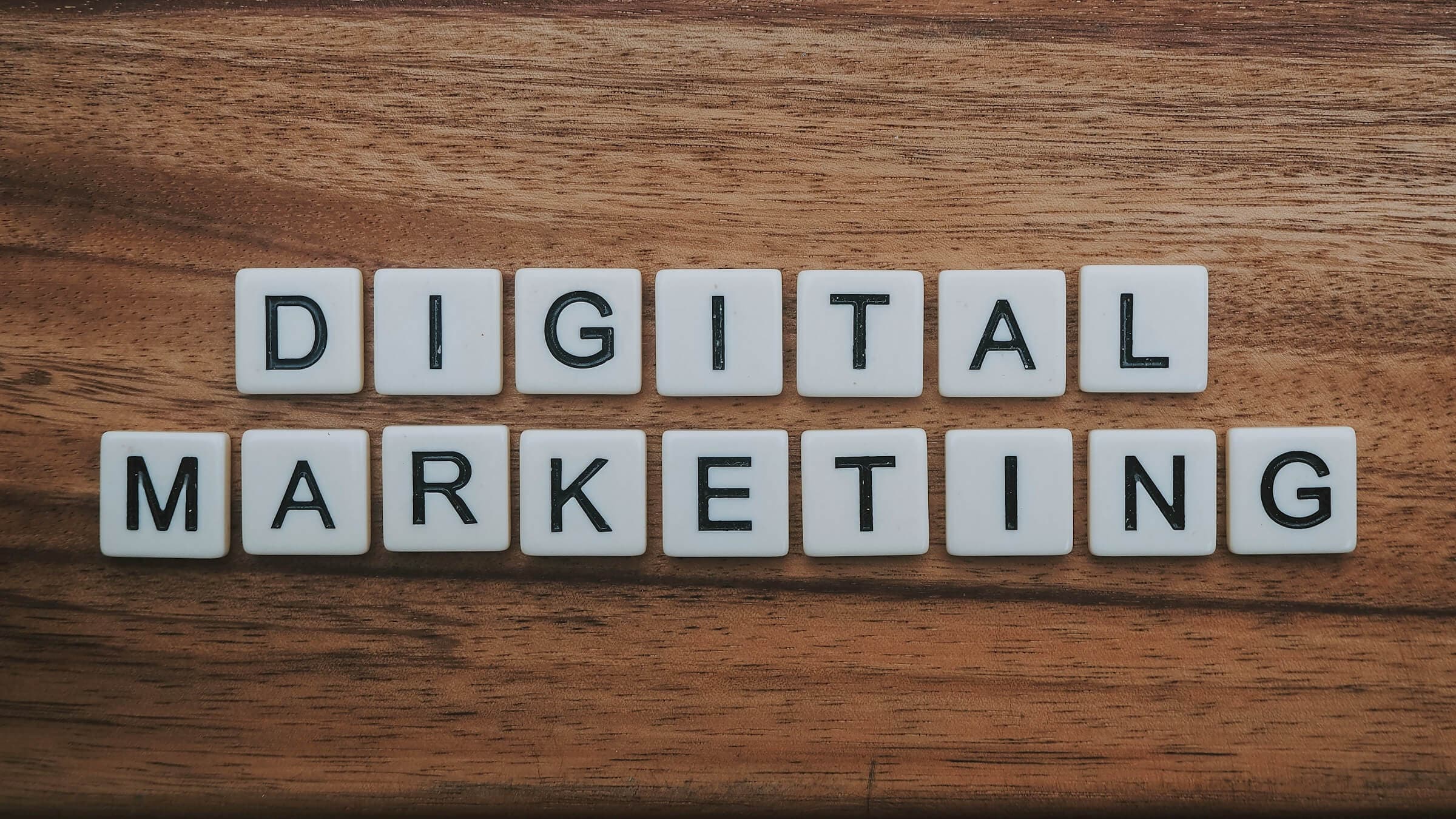 A set of Scrabble tiles indicating the word Digital Marketing